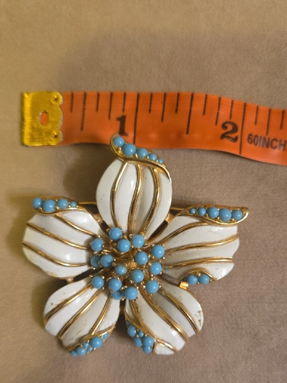 Gold-Trim White Enamel Floral Brooch with Blue Accent Beads